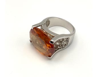 Anillo Park Lane Fashion Ring solitario de topacio ovalado facetado con circonita cúbica para mujer, talla 6