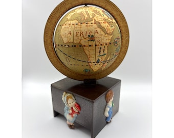 Caja de música con globo terráqueo giratorio, fabricada por George-Good Corp. en Hong Kong. Artículo de colección vintage de la década de 1970.