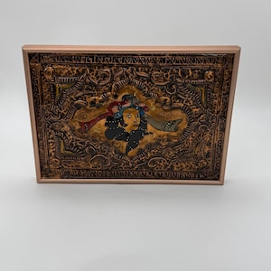 Obra de arte vintage enmarcada, en cobre repujado y pintado a mano.