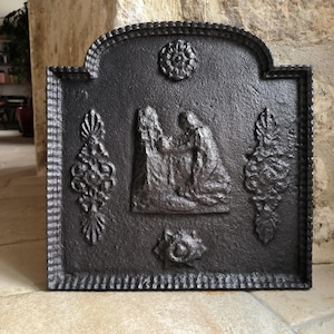 Antique, small, French, cast iron, fire back plate, depicting figure kneeling at alter. Circa late 1800&#39;s / early 1900&#39;s