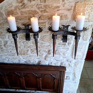 Pair of magnificent, large, antique, French, gothic, medieval style, wrought iron and wood, candle sconces. Circa late 1800&#39;s / early 1900&#39;s