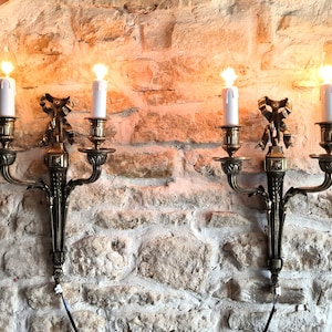 Very beautiful pair of vintage, French, Louis XVI style, solid bronze, two position, wall sconces. Circa late 1940&#39;s / 50&#39;s