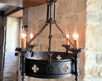 Utterly stunning, antique, French, wrought iron, artisan made, medieval style, 4 position chandelier. Circa mid to late 1800's