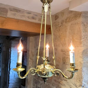 Absolutely gorgeous, small, antique, French, 3 position, falling arrow, Empire style bronze chandelier. Circa 1920&#39;s / 30&#39;s
