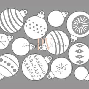 May include: A collection of white Christmas ornament designs on a gray background. The ornaments feature various patterns, including stripes, dots, and snowflakes. Each ornament has a small loop at the top for hanging. The image is suitable for holiday decor.