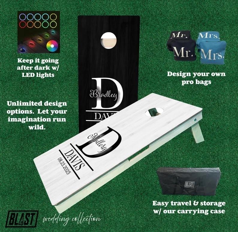 May include: A white and black personalized cornhole set with the names Bradley and Mallory Davis and the date 08.23.2025. The set includes a carrying case and two sets of bean bags.