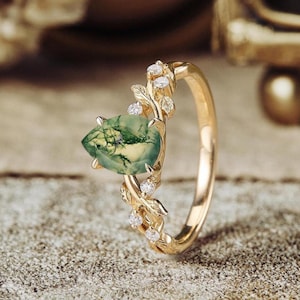 Päronmossagatring: Vintage 14k guld Art Deco-lövring