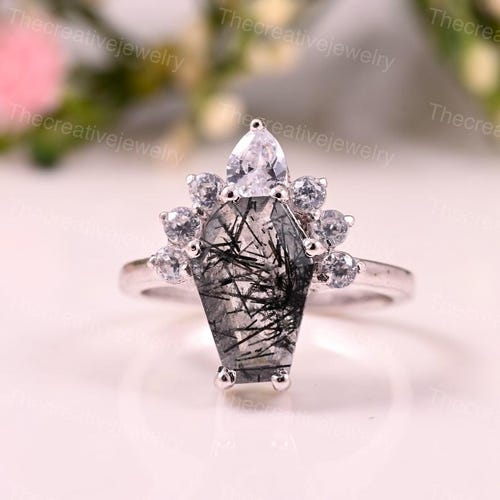 花の彫刻が施されたスターリングシルバーの結婚指輪：ヴィンテージ