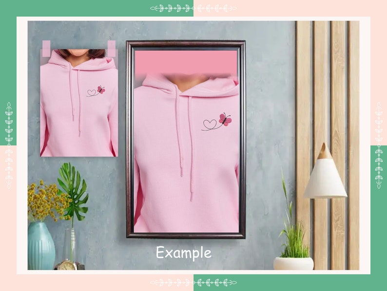 May include: Pink hoodie with a small heart and butterfly design on the front. The hoodie has a drawstring hood and a kangaroo pocket.