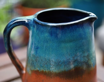 Twilight copper pitcher