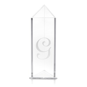 May include: Clear acrylic table number holder with a geometric shape and the letter "G" etched into the front.