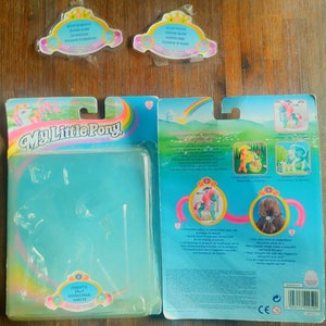 Package parts of My Little Pony G2 Jolly, Spring, Copper Glow and Silver Glow