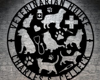 May include: Black metal sign with the words "Veterinarian House Charles S. Celley" and various animal silhouettes, including dogs, cats, and paw prints.