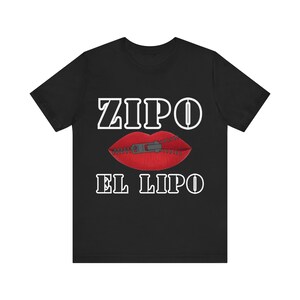 May include: Black t-shirt with white text that reads "ZIPO EL LIPO" and a red mouth with a zipper pulled up.