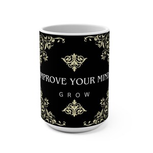 May include: White ceramic mug with a black background and gold filigree design. The mug features the text "IMPROVE YOUR MIND" above "GROW" in white. The mug has a white interior and a simple, elegant design.