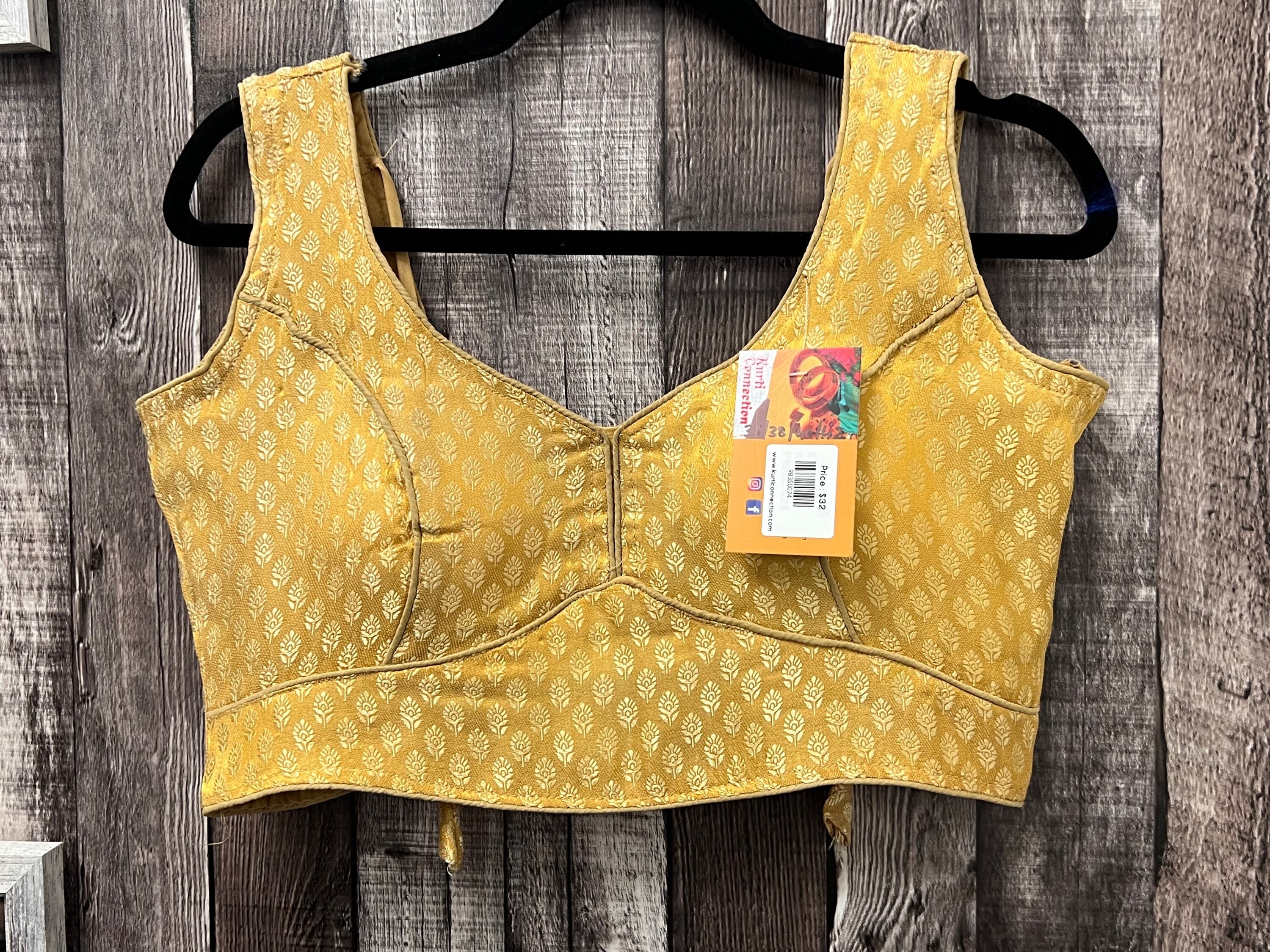 sleeveless golden blouse online