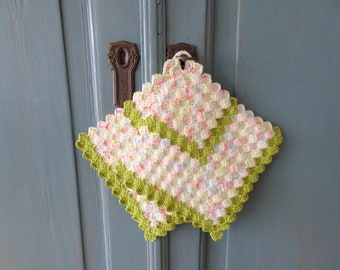 Crochet potholders pastel colours and green border