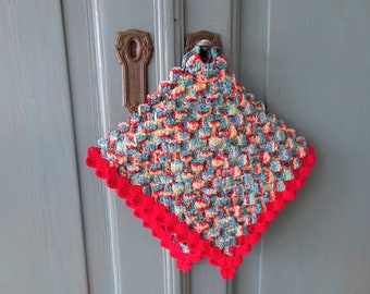 Crochet colourful potholders with red border