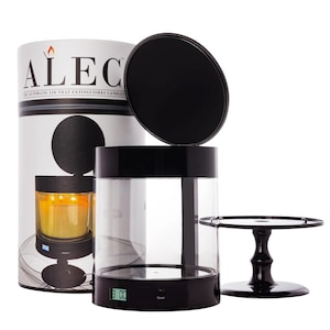 May include: A black candle holder with a clear glass cylinder and a black lid. The lid has a timer that displays "3:01". The candle holder is on a black base with a black pedestal.