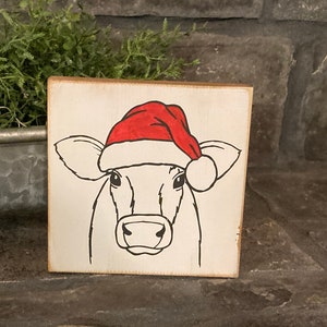 Christmas cow with Santa hat, small cute wooden Christmas sign