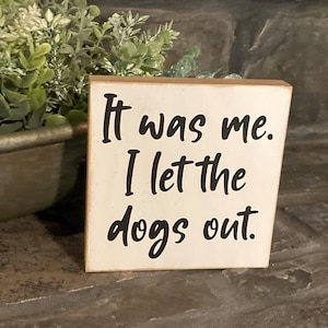 It was me. I let the dogs out. - small wood sign - plaque - cute - funny - dog