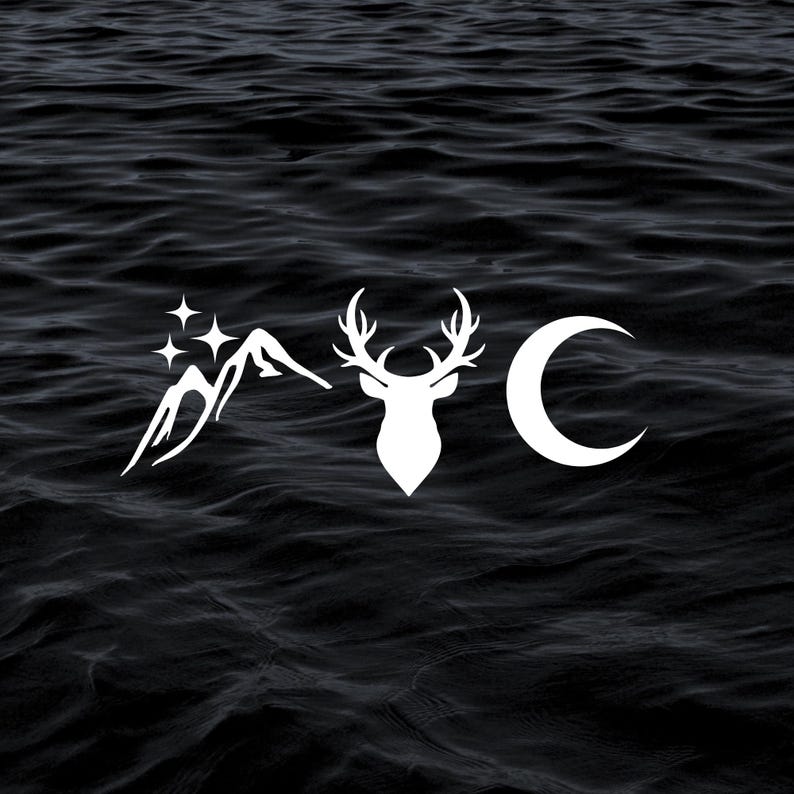 May include: A white silhouette of a mountain range with stars above it, a deer head, and a crescent moon on a black background.