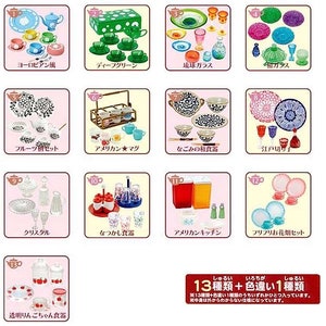 May include: A set of 13 miniature teacups and saucers in various styles and colours, including European, American, Japanese, and floral designs. The set also includes a teapot, sugar bowl, creamer, and other accessories. The text on the image reads "13種類+色違い1種類".