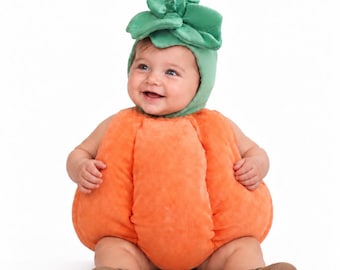 May include: A plush orange pumpkin-shaped costume featuring a rounded, segmented body and a matching green leaf-shaped hat. The costume is made of soft fabric and includes a pair of simple brown booties to complete the ensemble.