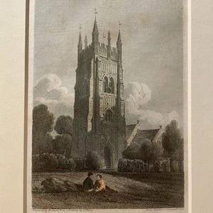 May include: A framed black and white print depicting Abbey Tower Evesham, Worcestershire. The detailed engraving shows the tower, trees, and two figures. The print includes text at the bottom, indicating the location and artist.