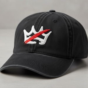May include: Black baseball cap with a curved brim. The cap features a white crown design with a red slash through it. The cap is made of a durable fabric and has a classic, casual style.