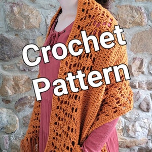 May include: A crocheted shawl with a pocket and fringe in a burnt orange color. The text "Crochet Pattern" is superimposed on the image.