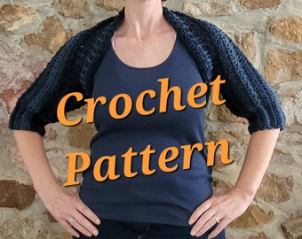 May include: A person wearing a dark blue crochet shrug over a navy blue tank top. The text "Crochet Pattern" is superimposed over the image.