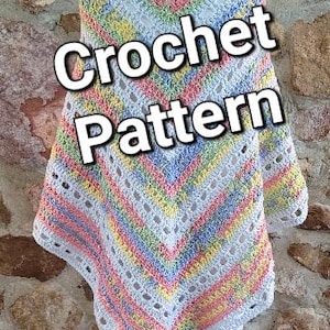 May include: A crochet shawl with a colorful striped pattern in shades of pink, yellow, blue, and green. The shawl is displayed on a mannequin against a stone wall. The text "Crochet Pattern" is superimposed on the image.