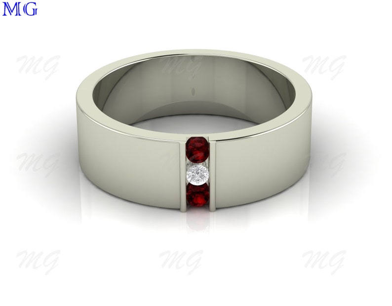 Puede incluir: Un anillo de banda de plata con tres piedras engastadas en fila. Las piedras son rojas y blancas.