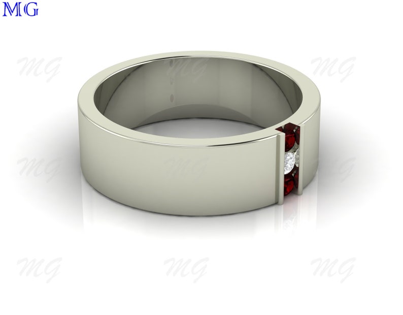 Puede incluir: Un anillo de banda de plata con una fila de piedras preciosas rojas y un solo diamante blanco en el centro.