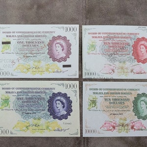 Souvenir und Spielgeld mit W/M MALAYA und British Borneo 1953 J. britische Kolonie.