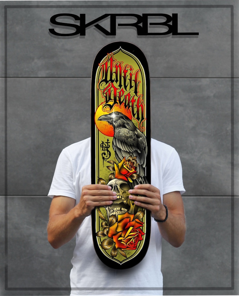 May include: A skateboard deck with a black and yellow design featuring a raven perched on a skull with roses. The text "Until Death" is written in a gothic font.
