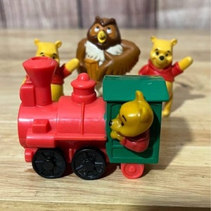 4er Set verschiedene Winnie the Pooh Figuren Inkl 1994 Disneyland Adventures
