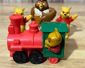 Set of 4 Assorted Winnie the Pooh Figurines Incl 1994 Disneyland Adventures
