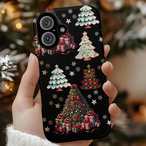 May include: Black phone case featuring a festive Christmas design. The case is adorned with illustrations of Christmas trees, wrapped gifts, snowflakes, and stars. The design incorporates red, green, white, and gold colors, creating a holiday theme.