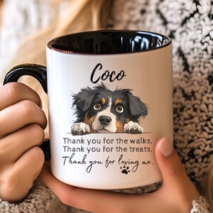 May include: A white ceramic mug with a black handle and interior, featuring a black and white illustration of a dog with the name Coco above it and the text: Thank you for the walks, Thank you for the treats, Thank you for loving me.