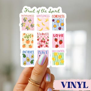 May include: A rectangular vinyl sticker titled Fruit of the Spirit, featuring nine grid sections with colorful illustrations of fruits and text labels including Faithfulness, Gentleness, Goodness, Joy, Kindness, Love, Patience, Peace, and Self-Control.