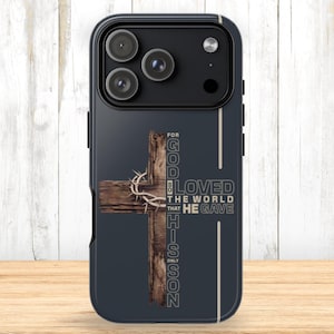 May include: A black phone case featuring a wooden cross with a crown of thorns and the text "For God so loved the world that He gave His only Son."