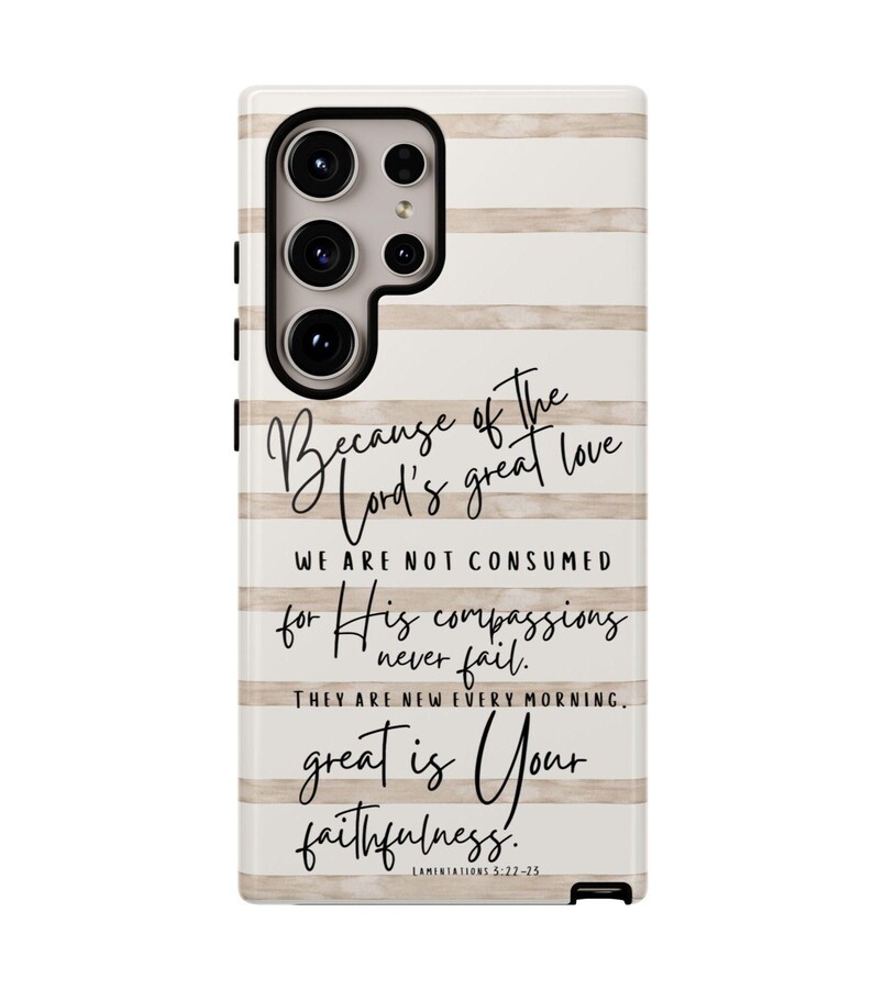 May include: A phone case with a cream and beige striped design. The case features a quote from Lamentations 5:22-25 in elegant script. The text reads "Because of the Lord's great love...great is Your faithfulness."