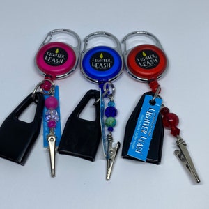 Lighter leash with multi use clip