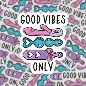 May include: A sticker with the words "GOOD VIBES ONLY" and illustrations of sex toys in pink, blue, and purple. The background features a repeating pattern of the same designs. The sticker is white with black text.
