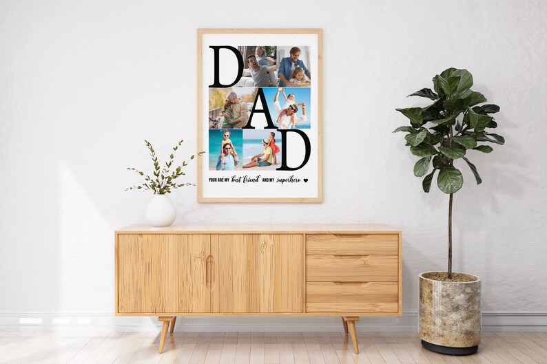 May include: A framed photo collage with the word "DAD" spelled out in large black letters. Each letter is filled with a different photo of a father and child. The text below the photos reads "You are my best friend and my superhero".
