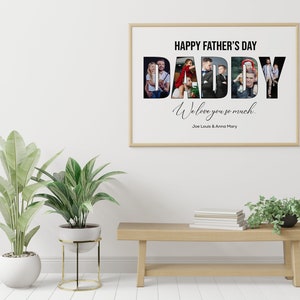 May include: A framed print with the words "HAPPY FATHER'S DAY DADDY" in black. The word "DADDY" is filled with family photos. Below the text is "We love you so much" and the names "Joe Louis & Anna Mary".