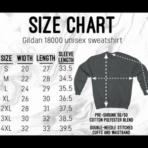 May include: Size chart for a Gildan 18000 unisex sweatshirt. The chart shows the size, width in inches, length in inches, and sleeve length in inches. The chart also includes information about the fabric blend and stitching.