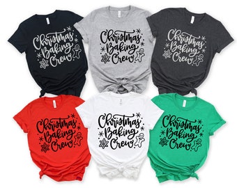 May include: A collection of six short-sleeved t-shirts in various colors: black, gray, charcoal, red, white, and green. Each shirt features the text "Christmas Baking Crew" in a script font with festive graphics.